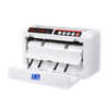 LD-100 Cordless Money Counter counting banknotes at outdoor market stall without power cable