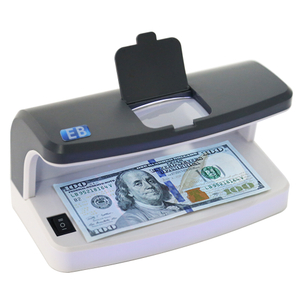 DC-5100 UV MG bank-grade banknote detector front view with built-in magnifier and rechargeable battery design